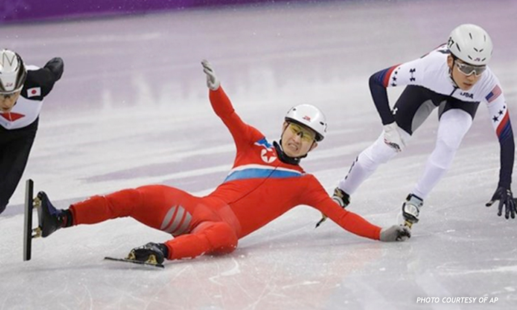 North Korean skater, disqualified after falling in Olympic pre-heat; some onlookers claim dirty tactics